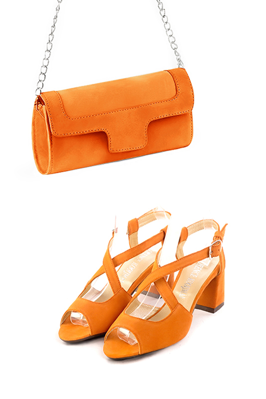 Dress clutch for wedding and parties in apricot orange leather - Worn view